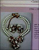 a beautiful vintage costume jewelry necklace, bracelet and earrings