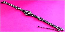 a beautiful vintage costume jewelry necklace, bracelet and earrings