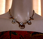 a beautiful Miriam Haskell vintage costume jewelry necklace, bracelet and earrings