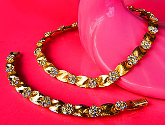 a beautiful Weiss vintage costume jewelry necklace and earrings