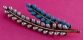 a beautiful vintage costume jewelry brooch unsigned