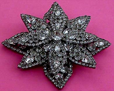 a beautiful vintage costume jewelry brooch unsigned