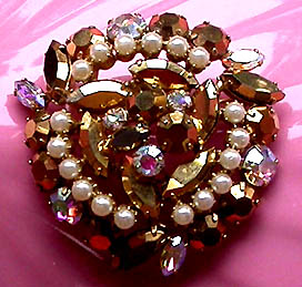 a beautiful vintage costume jewelry brooch unsigned
