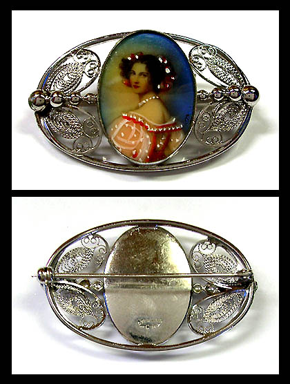 a beautiful vintage costume jewelry brooch unsigned