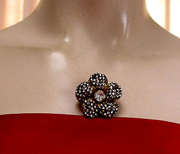 a beautiful vintage costume jewelry brooch signed