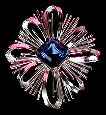 a beautiful vintage costume jewelry brooch unsigned