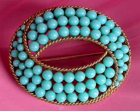 a beautiful vintage costume jewelry brooch unsigned
