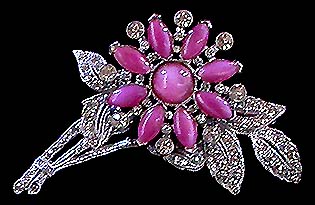 a beautiful vintage costume jewelry brooch unsigned