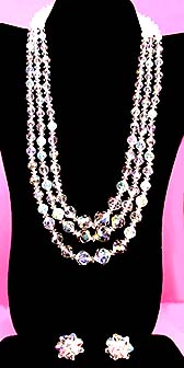 a beautiful vintage costume jewelry necklace, bracelet and earrings