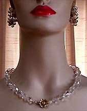 a beautiful vintage costume jewelry necklace, bracelet and earrings