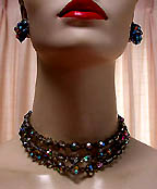 a beautiful vintage costume jewelry necklace, bracelet and earrings