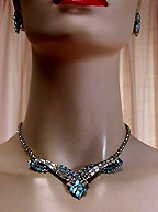 a beautiful vintage costume jewelry necklace, bracelet and earrings