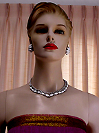 a beautiful vintage costume jewelry necklace, bracelet and earrings