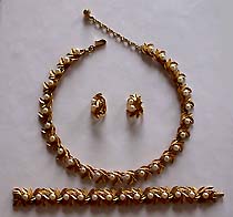 a beautiful Hobe vintage costume jewelry necklace, bracelet and earrings