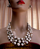a beautiful vintage costume jewelry necklace, bracelet and earrings
