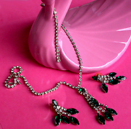 a beautiful vintage costume jewelry necklace, bracelet and earrings