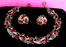a beautiful vintage costume jewelry necklace, bracelet and earrings