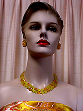 a beautiful vintage costume jewelry necklace, bracelet and earrings