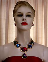 a beautiful vintage costume jewelry necklace, bracelet and earrings