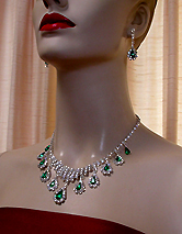 a beautiful vintage costume jewelry necklace, bracelet and earrings