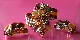 a beautiful vintage costume jewelry necklace, bracelet and earrings