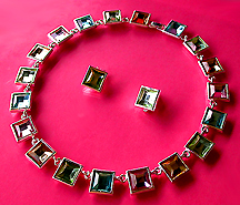 a beautiful vintage costume jewelry necklace, bracelet and earrings