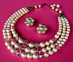 a beautiful vintage costume jewelry necklace, bracelet and earrings