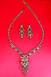 a beautiful Hobe vintage costume jewelry necklace, bracelet and earrings