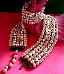a beautiful vintage costume jewelry necklace, bracelet and earrings