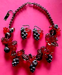a beautiful vintage costume jewelry necklace, bracelet and earrings