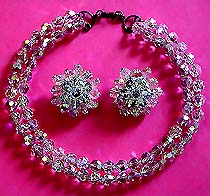 a beautiful vintage costume jewelry necklace, bracelet and earrings